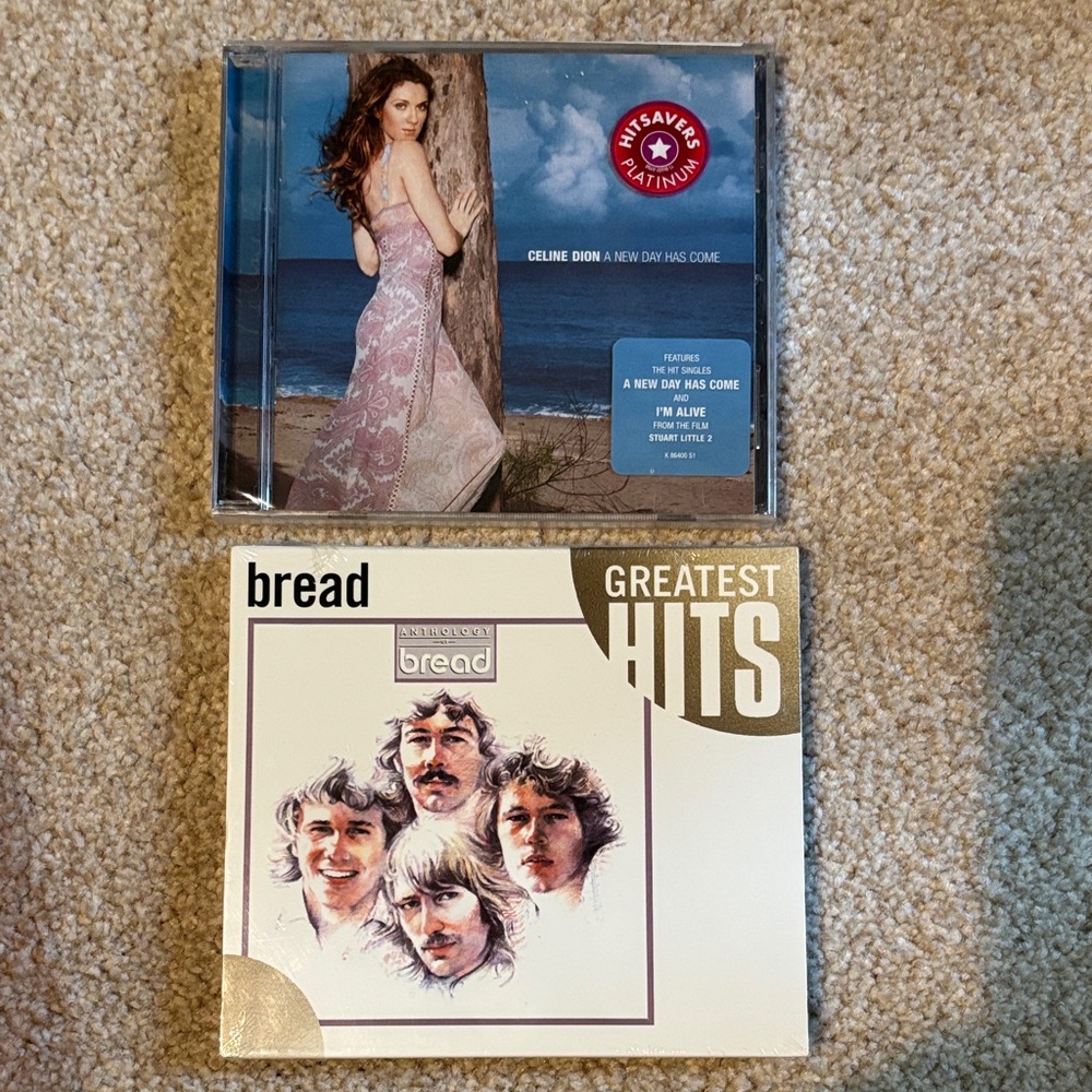 Celine Dion and Bread Greatest Hits CDs